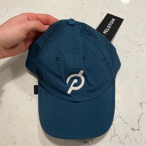 NWT - Peloton Run Hat. Color: deep teal. One Size. Never worn.